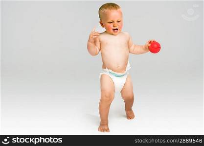 Baby Holding Red Ball