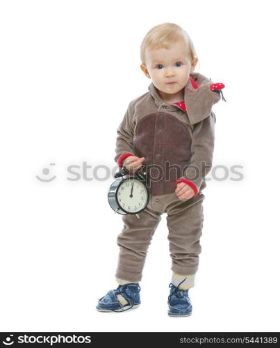 Baby in Santa&rsquo;s deer costume holding alarm clock