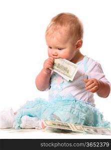 baby is eating money on white background