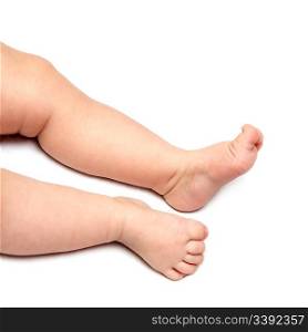 baby legs close-up on white background