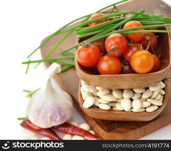 Baby Lima Beans , Tomatoes And Spices In Wooden Bowls