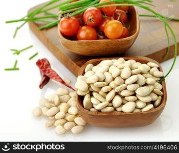 Baby Lima Beans , Tomatoes And Spices In Wooden Bowls