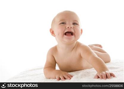 Baby lying down smiling