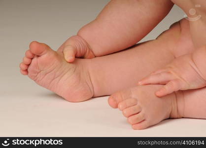 Baby playing with his feet