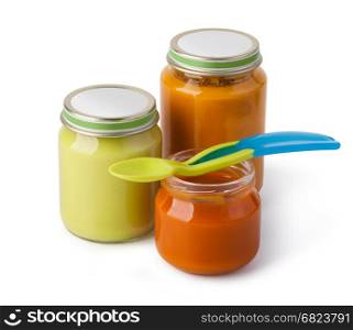 baby puree. baby puree with spoon isolated on white background