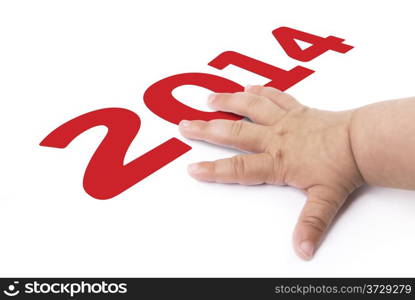 baby&rsquo;s hand celebrating 2014 new year on a white background