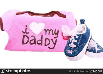 Baby shoes and suits with a message for the fathers day