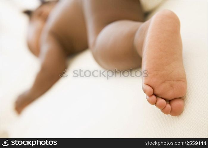 Baby sleeping with focus on foot