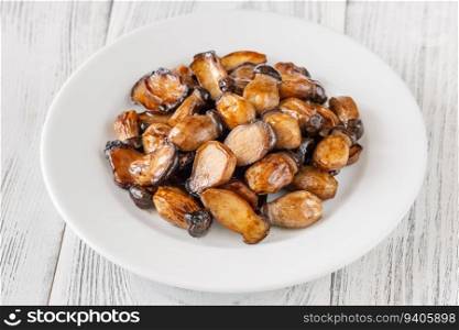 Baby teriyaki eryngii mushrooms on the plate