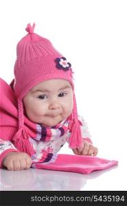 Baby weared in fashion hat with pigtails and scarf isolated on white