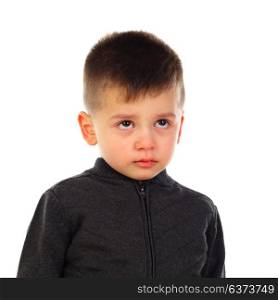 Baby with a serious expression isolated on a white background