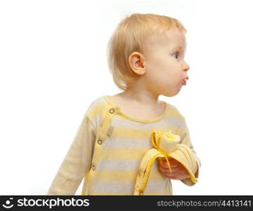 Baby with banana looking on side isolated on white