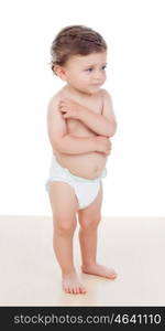 Baby with one years old doing funny gestures isolated on white background