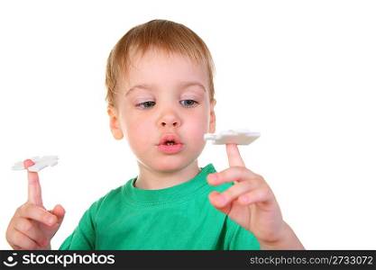 baby with puzzle on finger