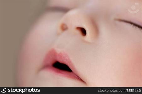babyhood, childhood and people concept - close up of sleeping asian baby boy face. close up of sleeping asian baby boy face. close up of sleeping asian baby boy face