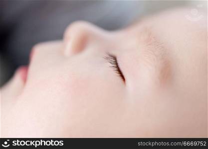 babyhood, childhood and people concept - close up of sleeping asian baby boy face. close up of sleeping asian baby boy face. close up of sleeping asian baby boy face
