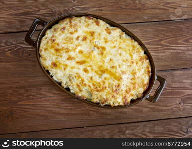 Bacalhau com natas - Fish casserole with potatoes. Portuguese cuisine