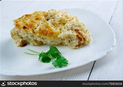 Bacalhau com natas - Fish casserole with potatoes. Portuguese cuisine
