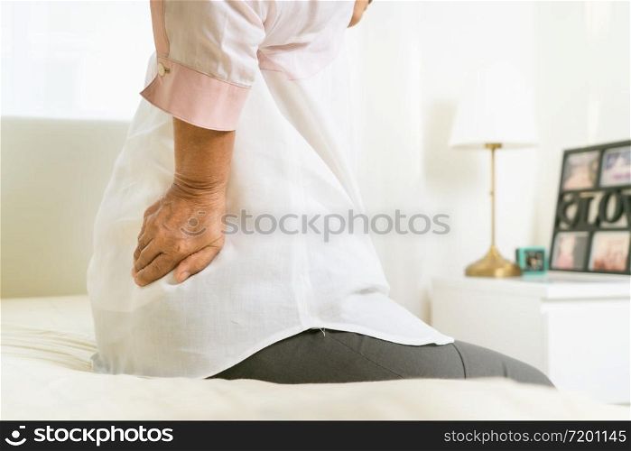 Back pain of old woman at home, healthcare problem of senior concept