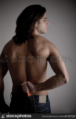 back pose of muscular man against white background