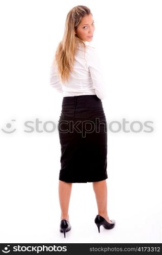 back pose of standing manager looking at camera with white background