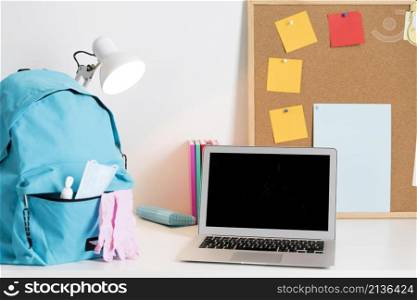 back school arrangement new normal times with laptop