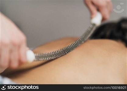 Back Scraping Massage with Metal Rolling Pin