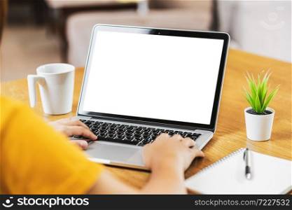 Back side of Asian business woman using laptop with white screen for creative and design in modern of house, working from home and stay at home when covid-19 outbreak,blank screen mockup copy space