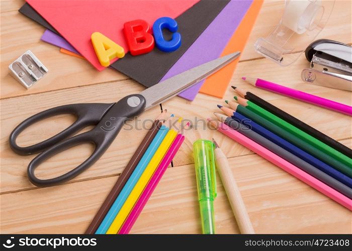 Back to school concept on a blue wooden background