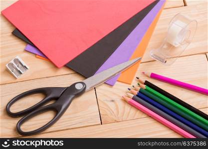 Back to school concept on a wooden background