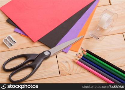 Back to school concept on a wooden background
