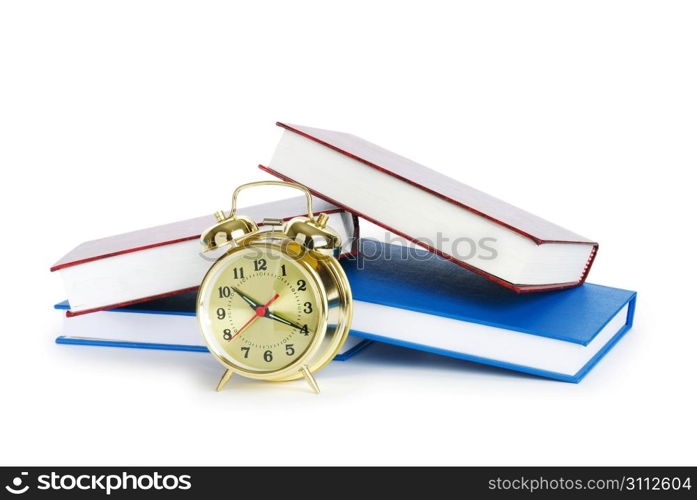 Back to school concept with books and clock