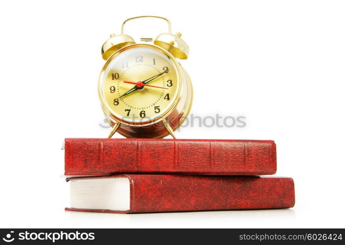 Back to school concept with books and clock