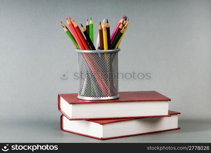 Back to school concept with books and pencils