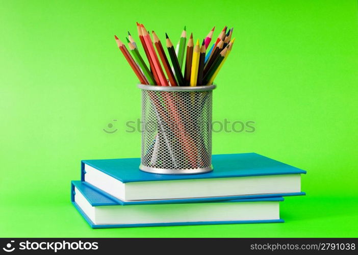 Back to school concept with books and pencils