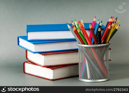 Back to school concept with books and pencils