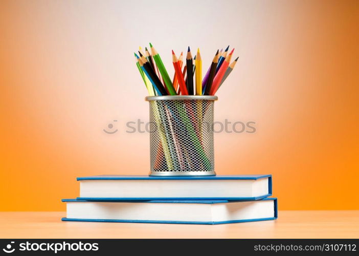 Back to school concept with books and pencils