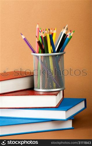 Back to school concept with books and pencils