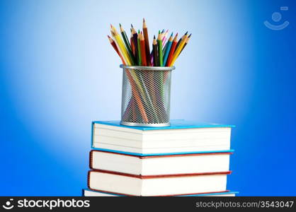 Back to school concept with books and pencils