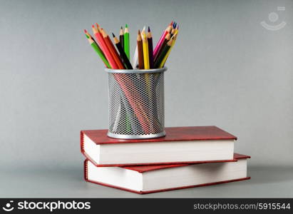 Back to school concept with books and pencils