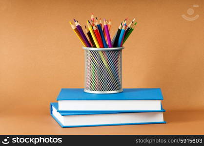 Back to school concept with books and pencils