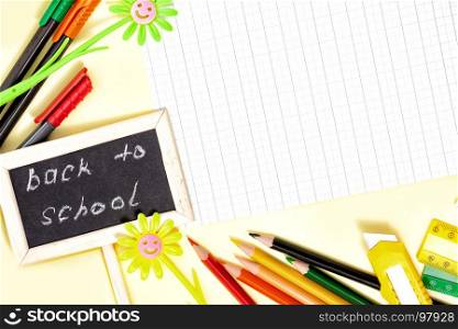 Back to School Conceptl: Colorful Felt Pens and Pancils, Sheet of Paper, Yellow and Green Daisy and Little Blackboard on the Yellow Background