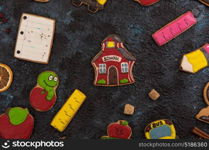 Back to school gingerbreads. Back to school gingerbreads cookies on a dark background