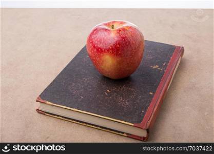 Back to school lettering and an apple on a book