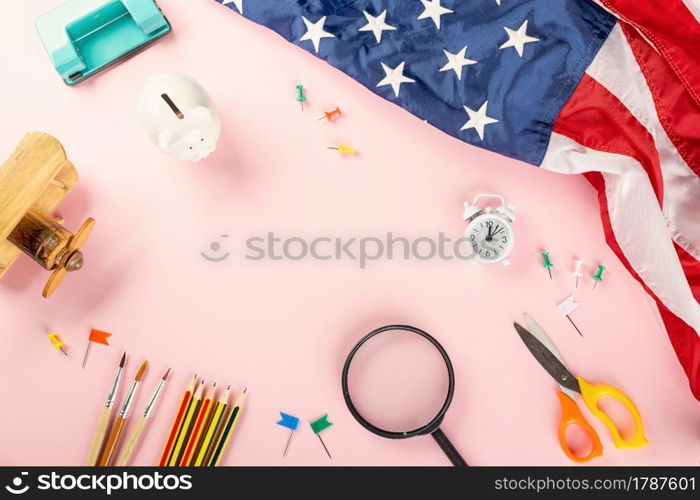 Back to school or college concept. Top view of school supplies stationery and American flag, studio shot isolated on pink background, Back to education new normal during outbreak of coronavirus