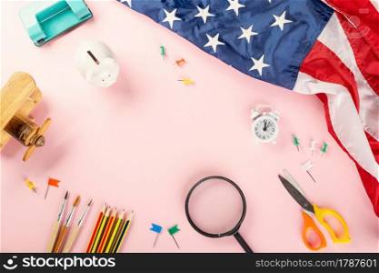 Back to school or college concept. Top view of school supplies stationery and American flag, studio shot isolated on pink background, Back to education new normal during outbreak of coronavirus