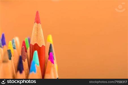 Back to school, Red pencil standing out from crowd, plenty business success concept