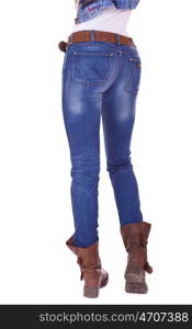 Back view of a long woman legs posing with jeans isolated on a white background