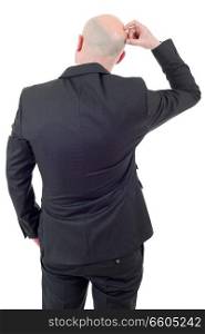 Back view of a worried businessman thinking, isolated