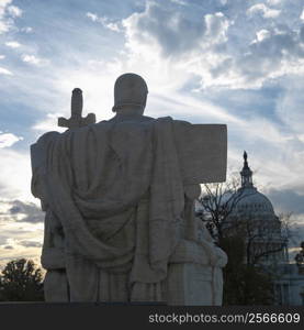 Back view of Authority of Law sculpture in front of Supreme Court building with in Washington DC, USA.